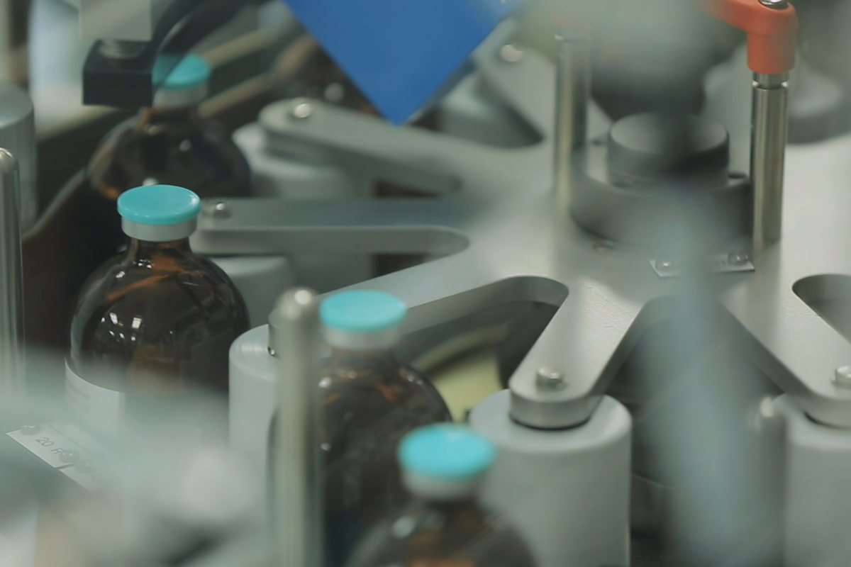 pharmaceutical bottles on a conveyor belt